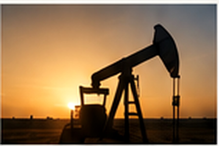 Oil pump operating at sunset